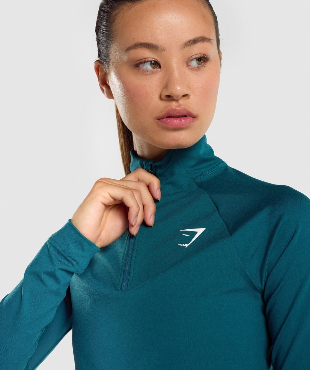 gymshark-training-1-4-zip-niagara-teal