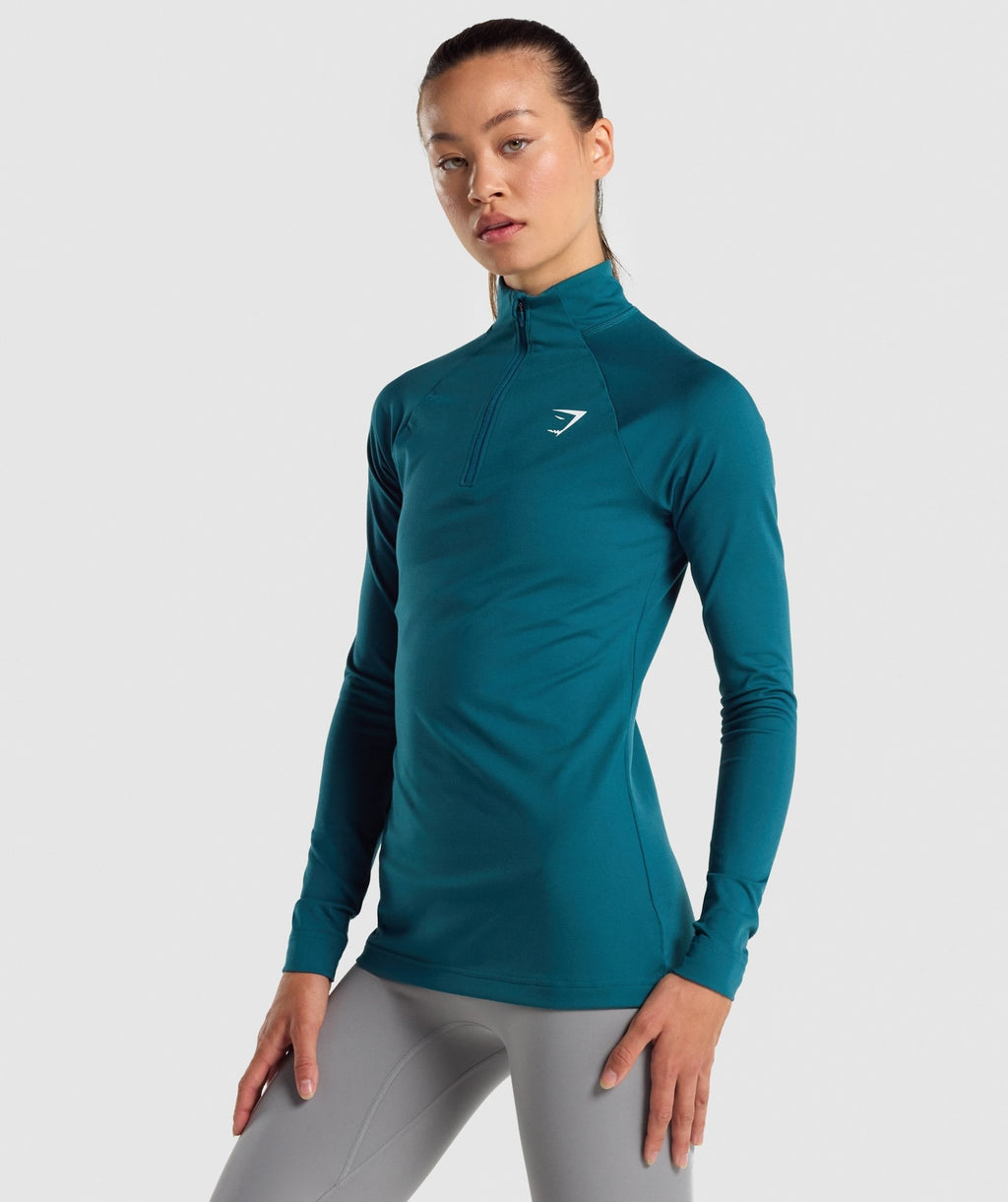 gymshark-training-1-4-zip-niagara-teal