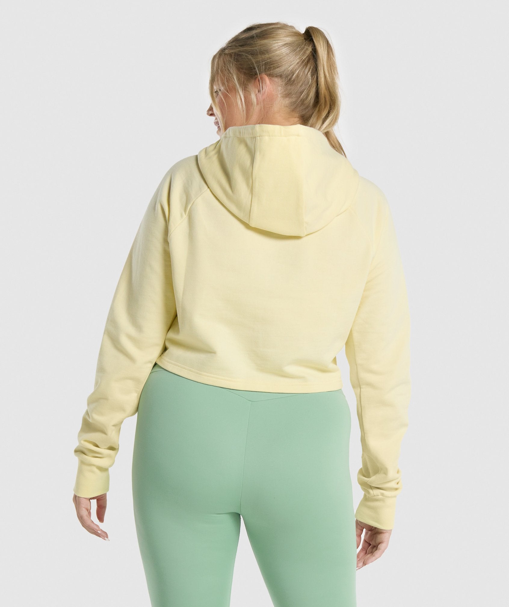 gymshark-training-cropped-hoodie-light-yellow