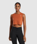gymshark-training-crop-tank-rust-orange-aw23
