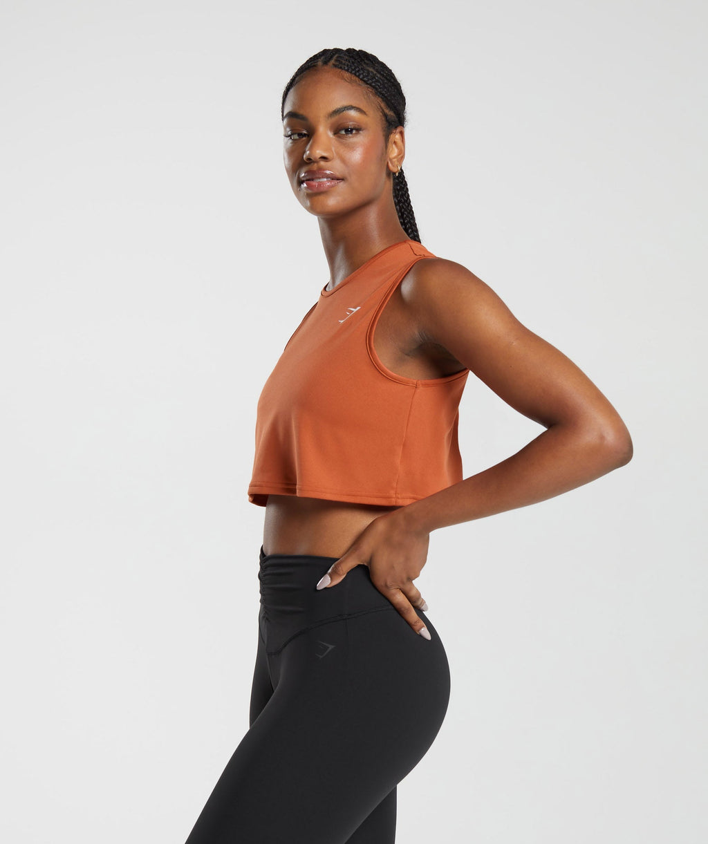 gymshark-training-crop-tank-rust-orange-aw23