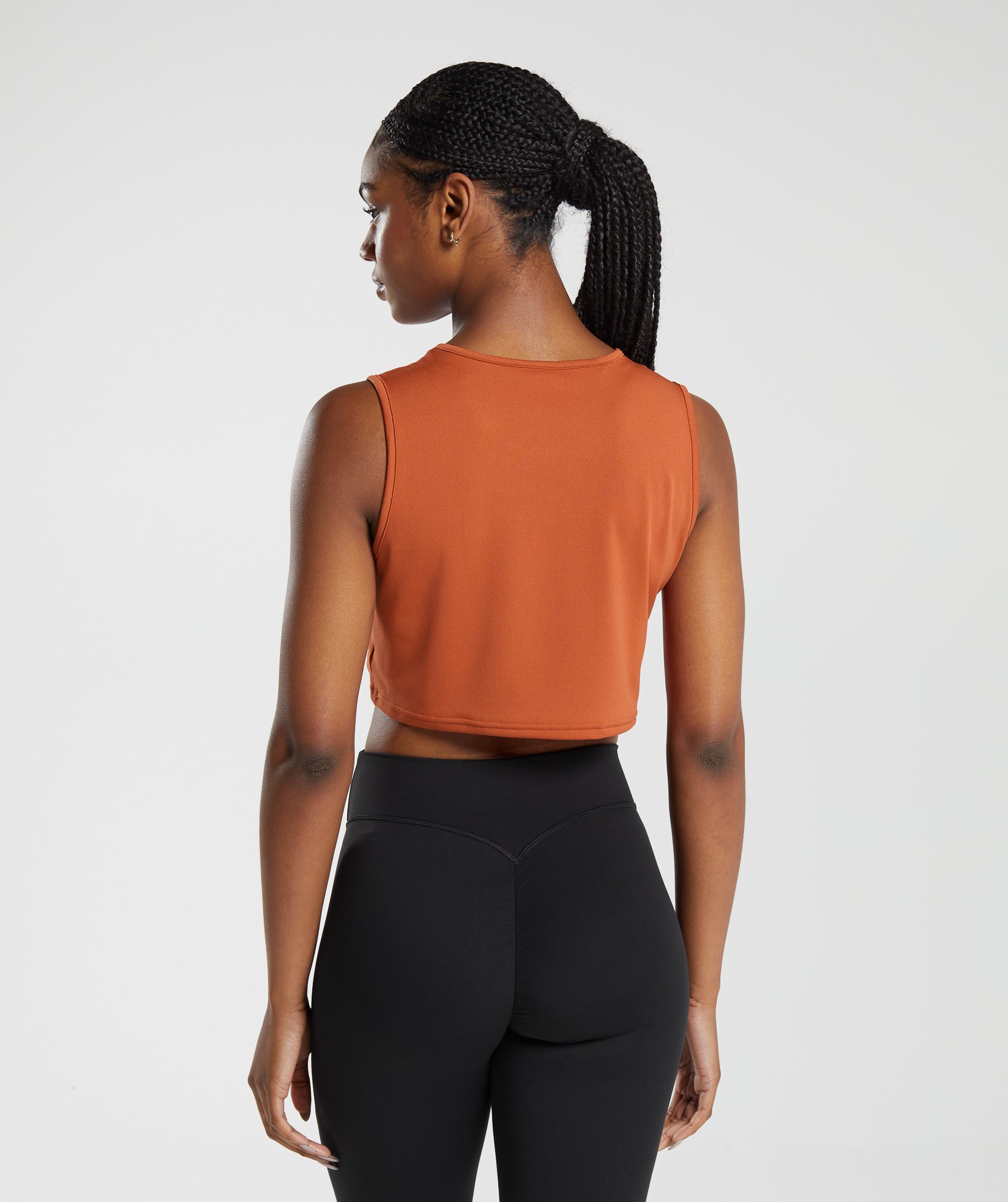gymshark-training-crop-tank-rust-orange-aw23