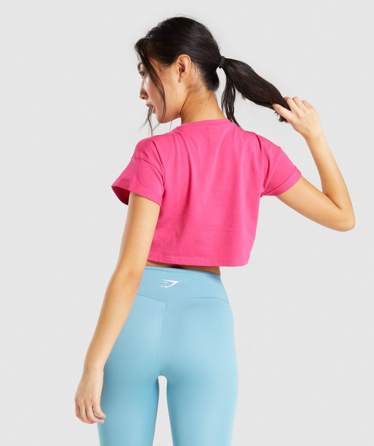 gymshark-fraction-crop-top-pink-white-logo