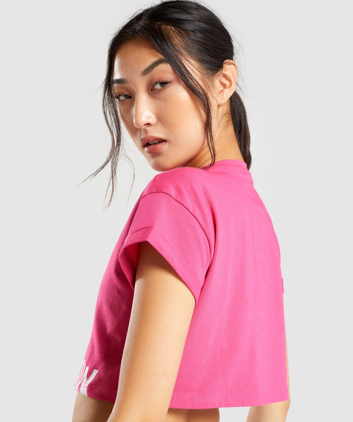 gymshark-fraction-crop-top-pink-white-logo