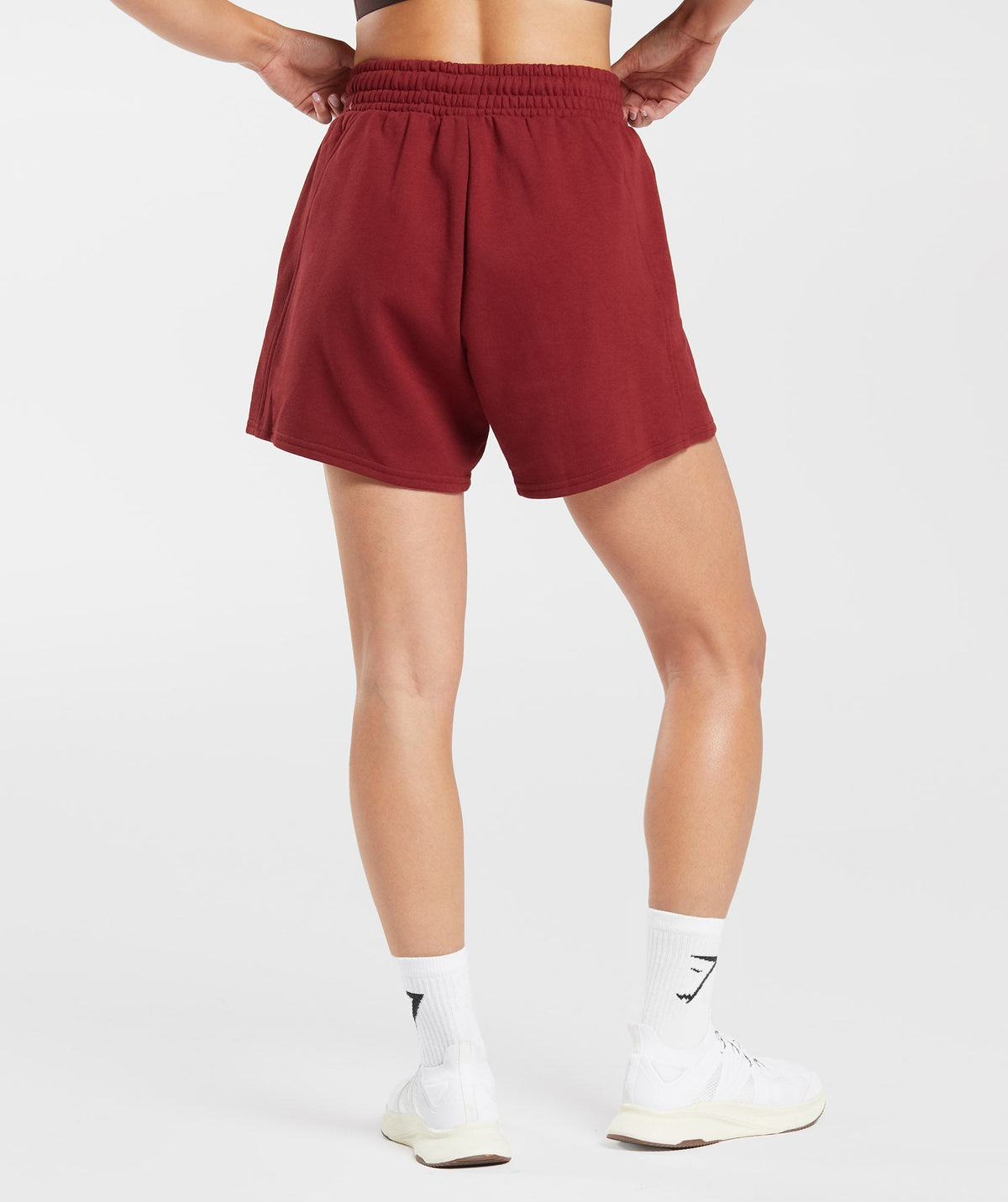 gymshark-training-fleece-shorts-spiced-red-aw23