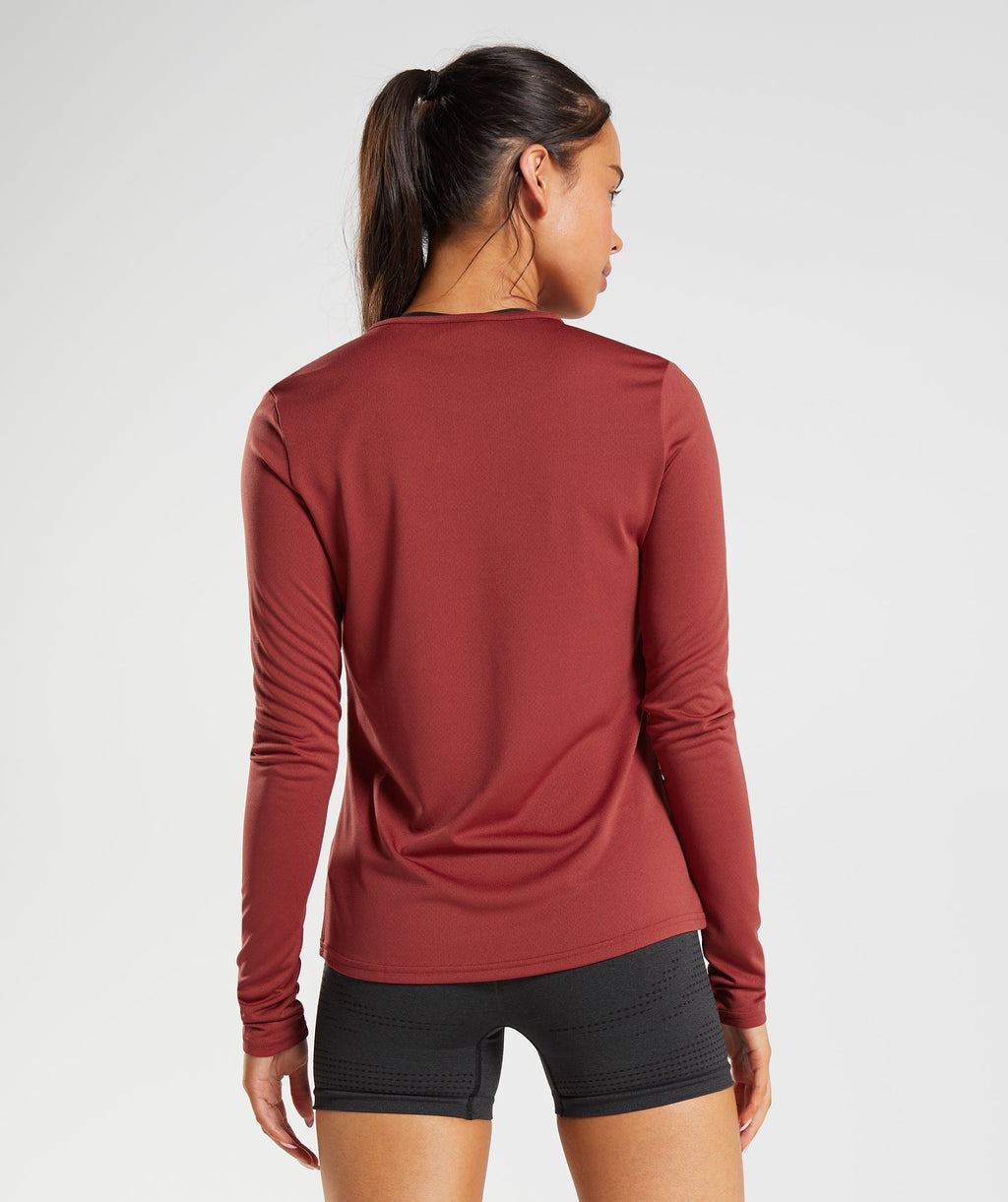 gymshark-training-long-sleeve-top-rosewood-red-aw22