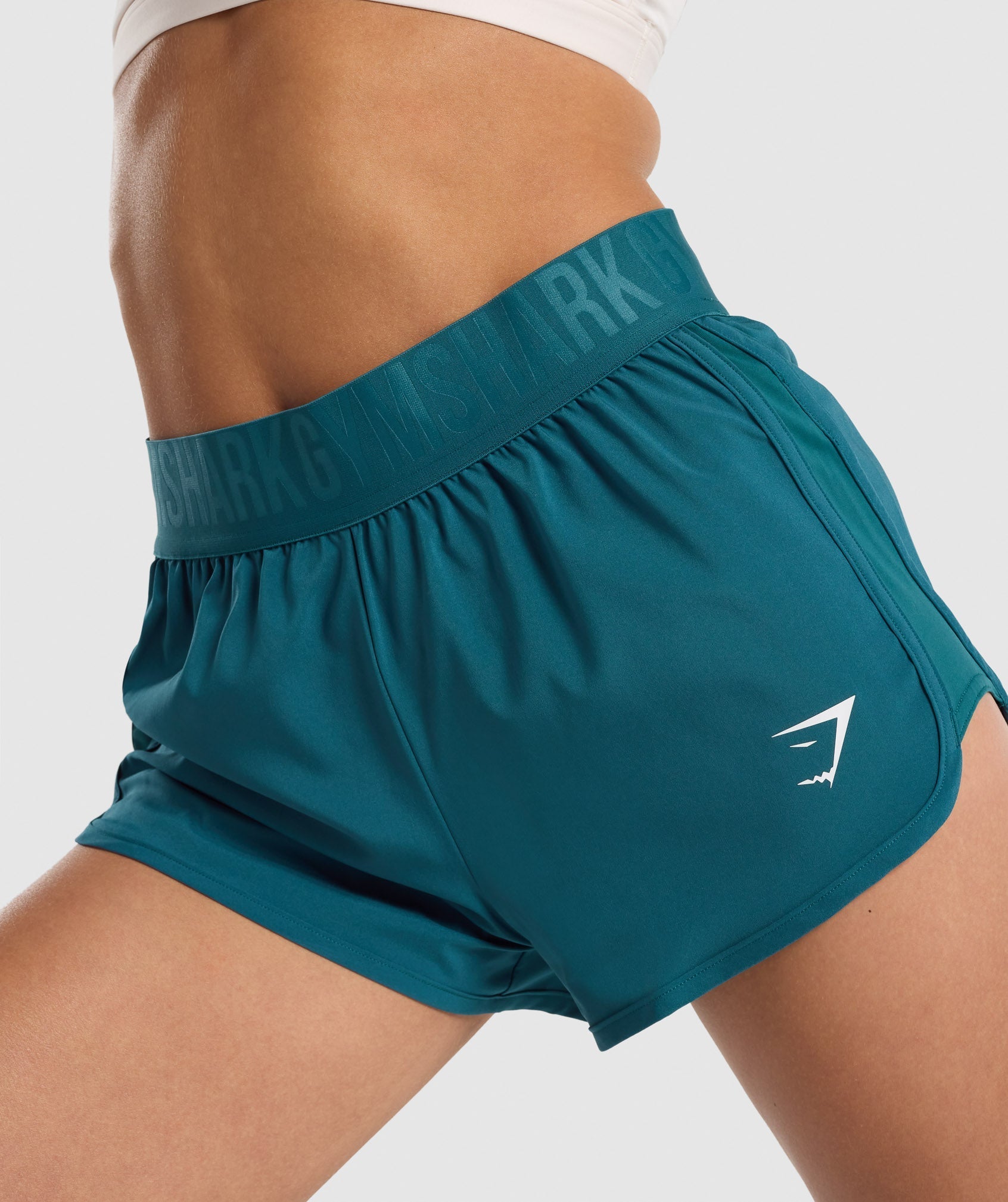 gymshark-training-woven-shorts-teal