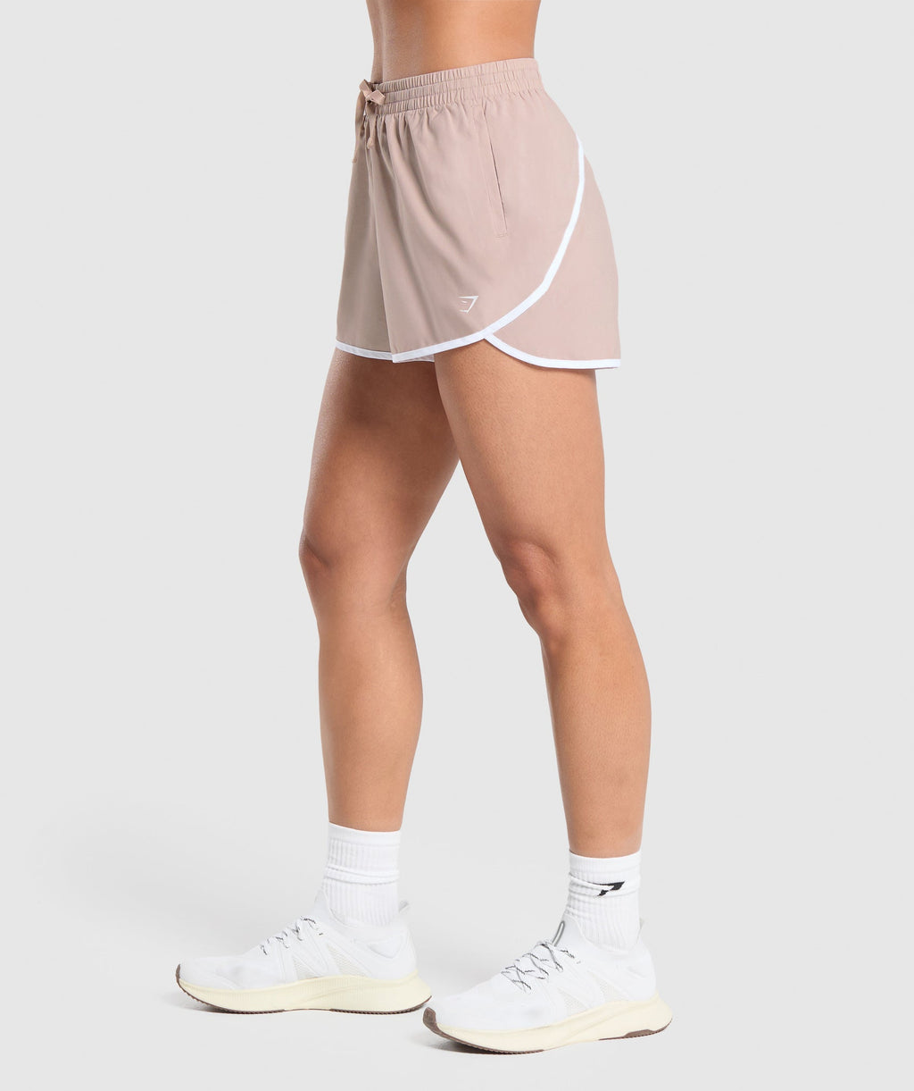 gymshark-training-contrast-loose-shorts-2-5-stone-pink-ss24