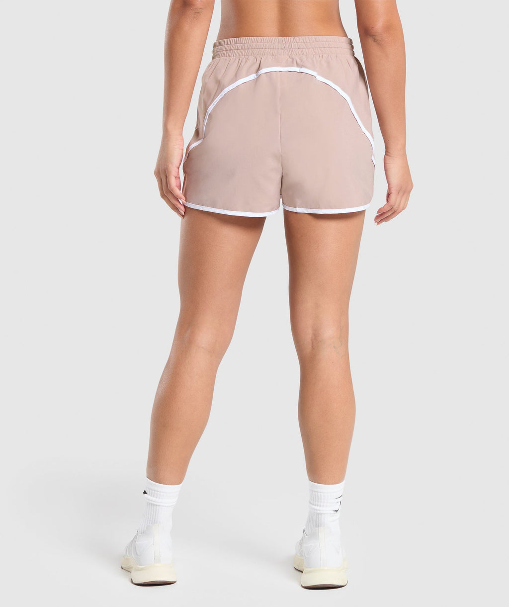 gymshark-training-contrast-loose-shorts-2-5-stone-pink-ss24