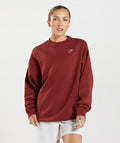 gymshark-training-oversized-sweatshirt-rosewood-red-aw22