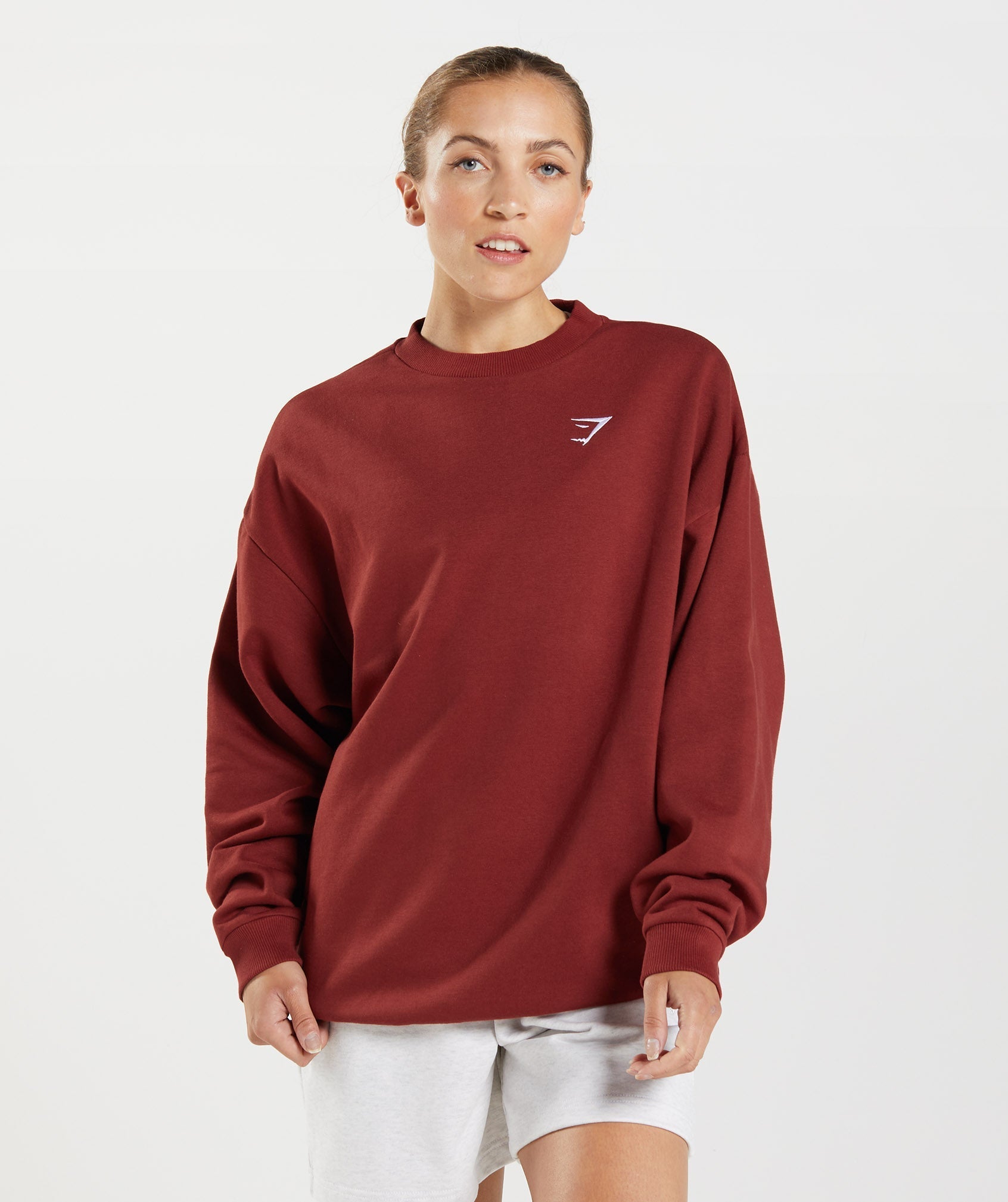 gymshark-training-oversized-sweatshirt-rosewood-red-aw22