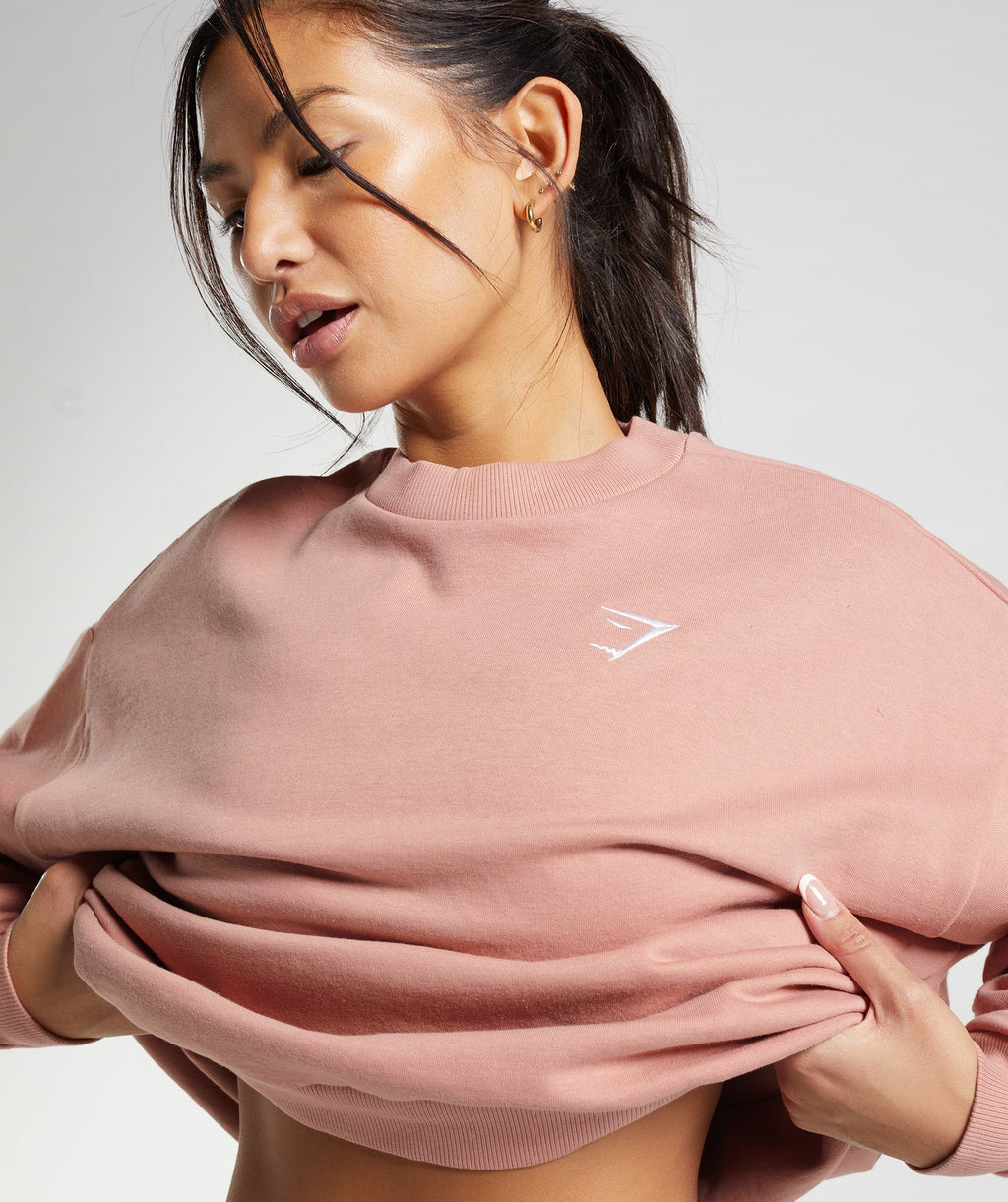 gymshark-training-oversized-sweatshirt-hazy-pink-ss23