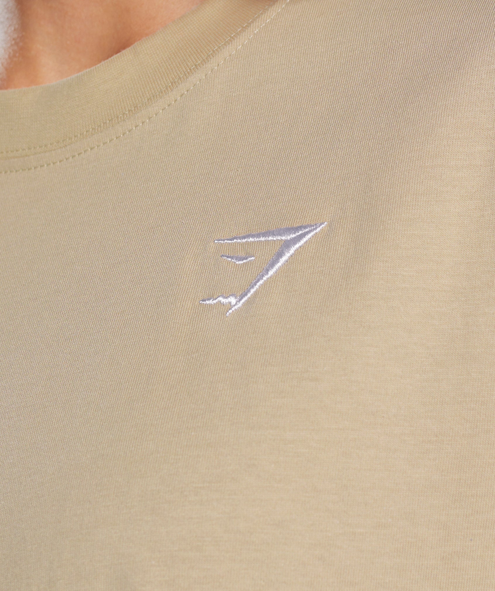 gymshark-training-oversized-t-shirt-desert-beige-aw23