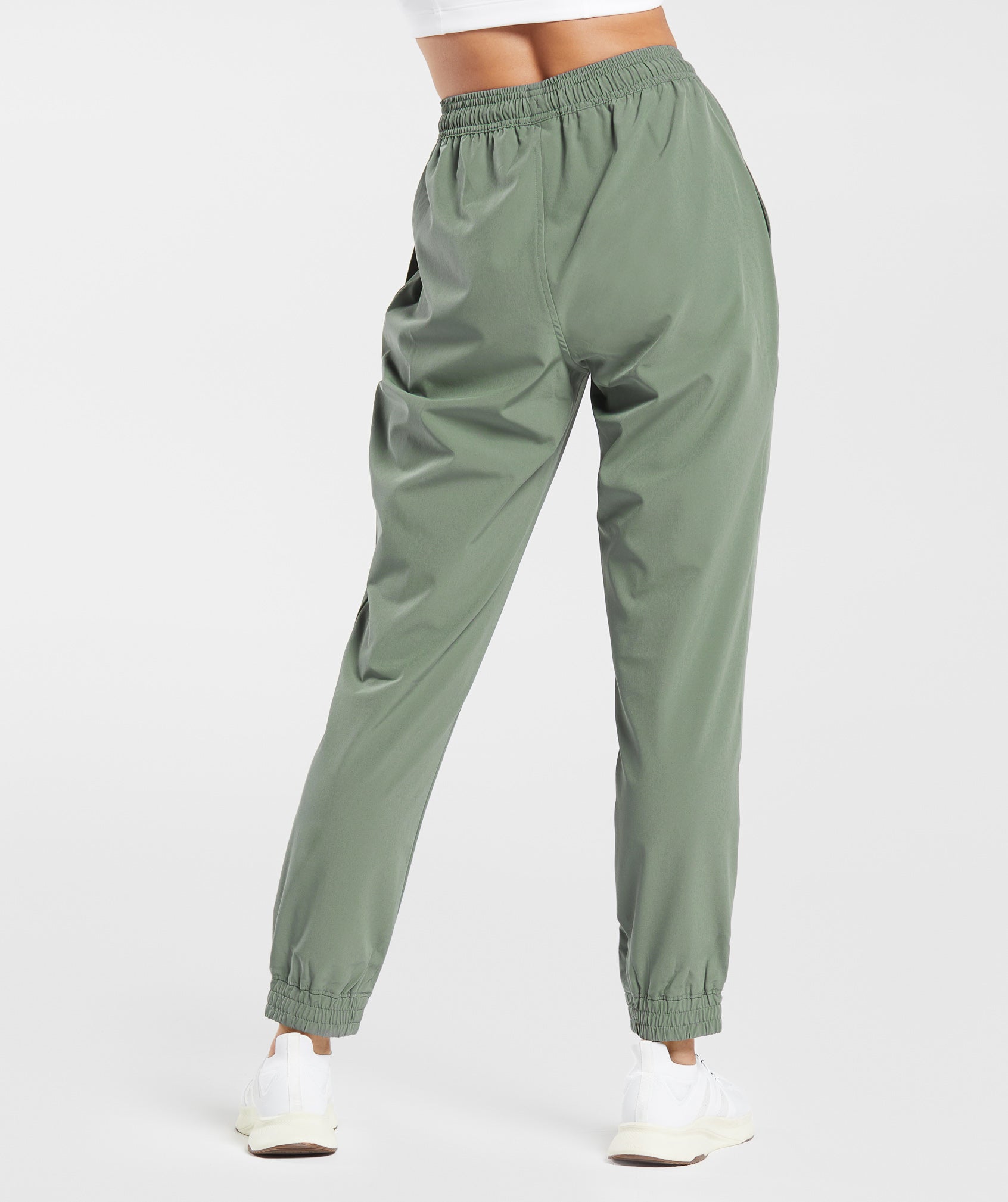gymshark-training-woven-joggers-dusk-green-aw23