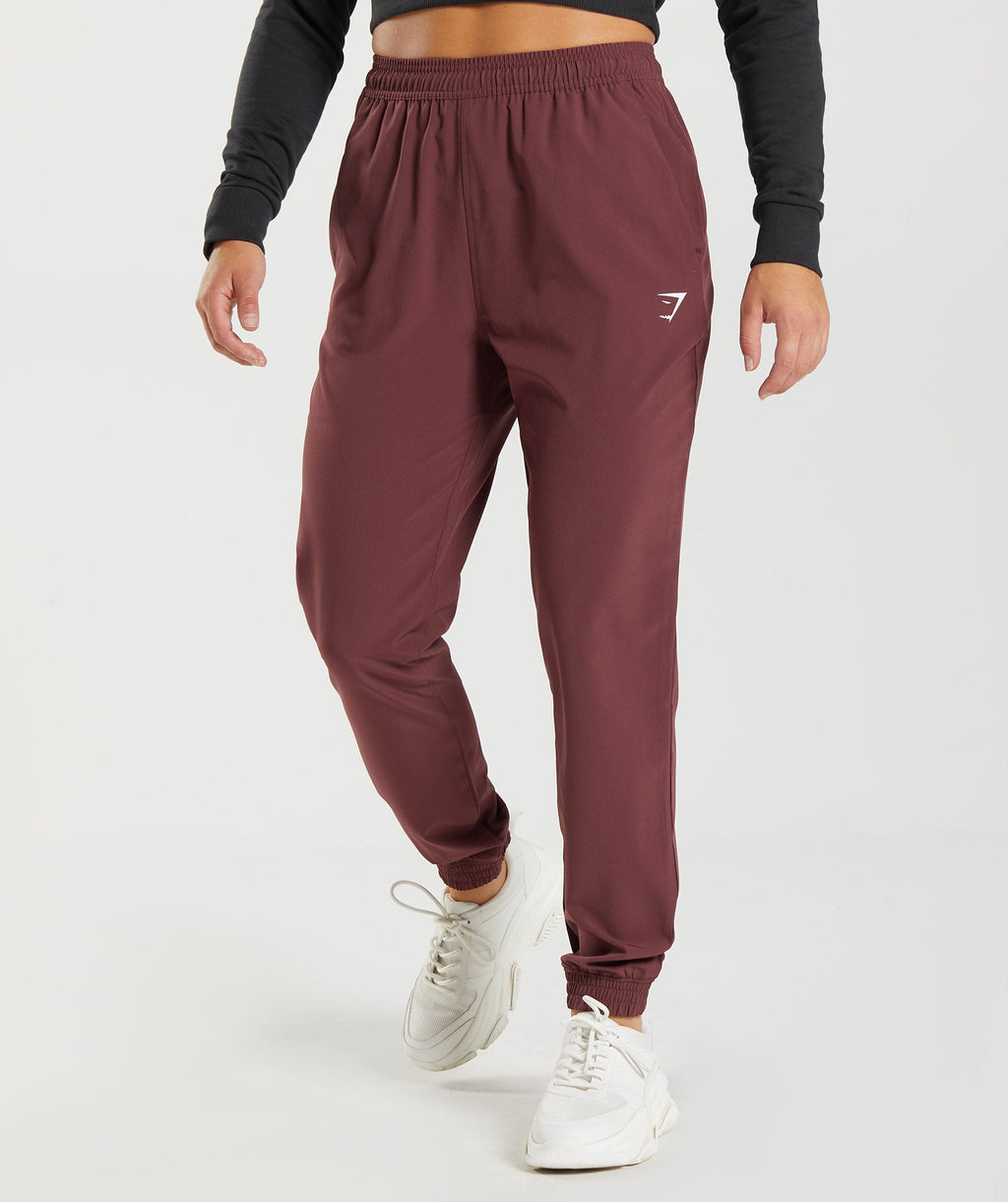 gymshark-training-woven-joggers-cherry-brown-aw22