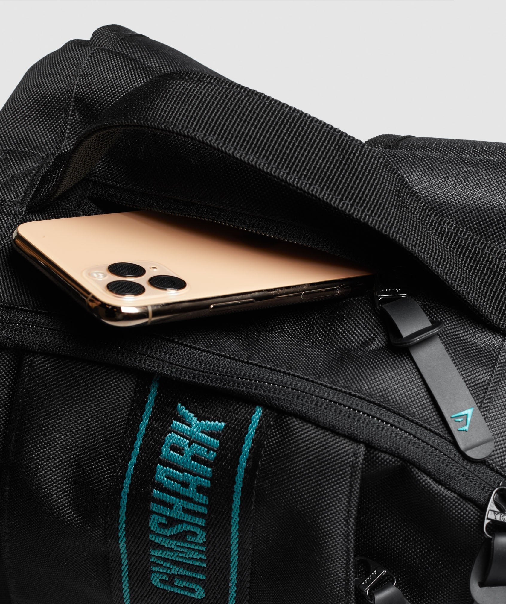 gymshark-taped-backpack-black-teal-aw21