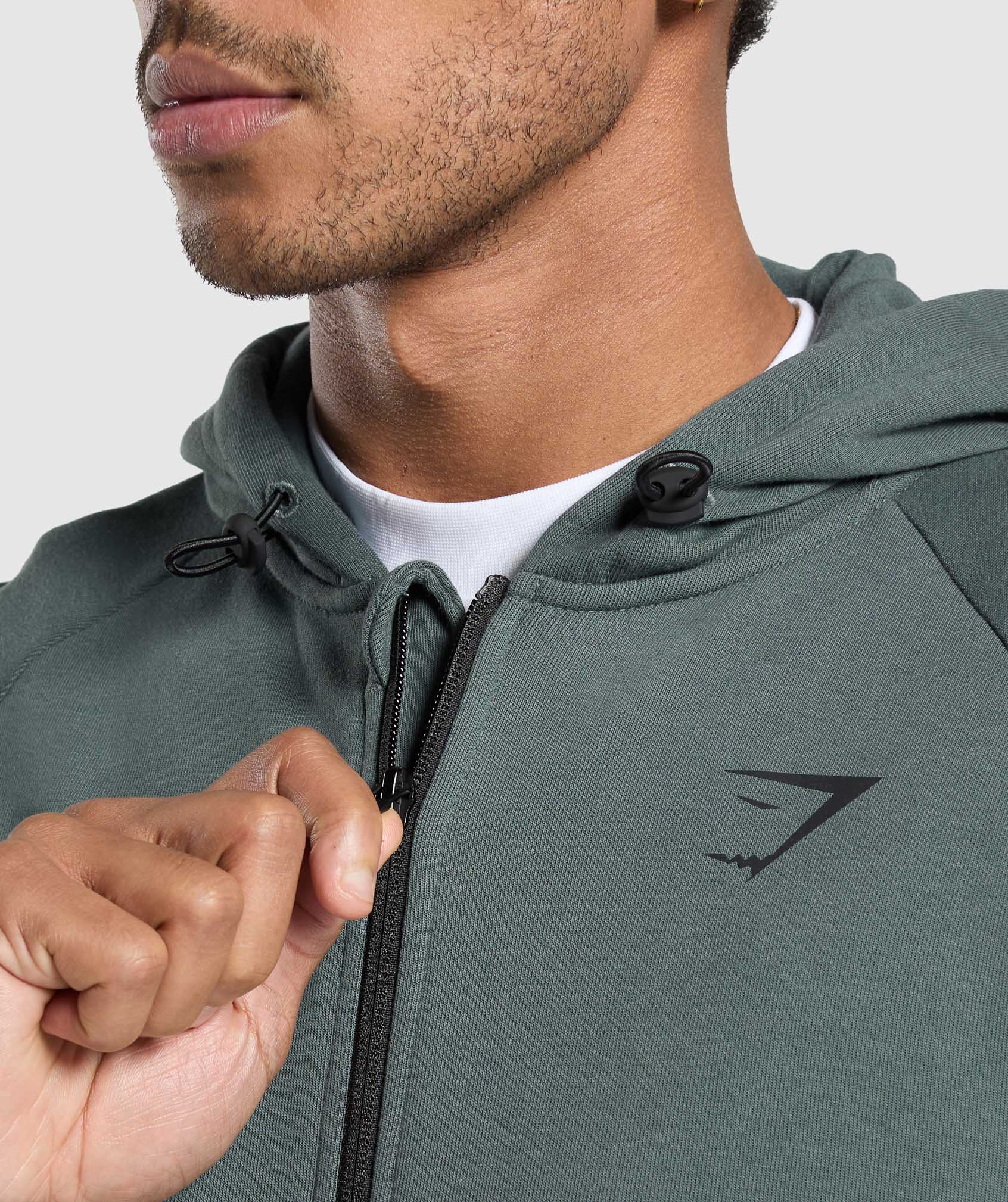 gymshark-interlock-tech-zip-up-hoodie-slate-teal-ss25