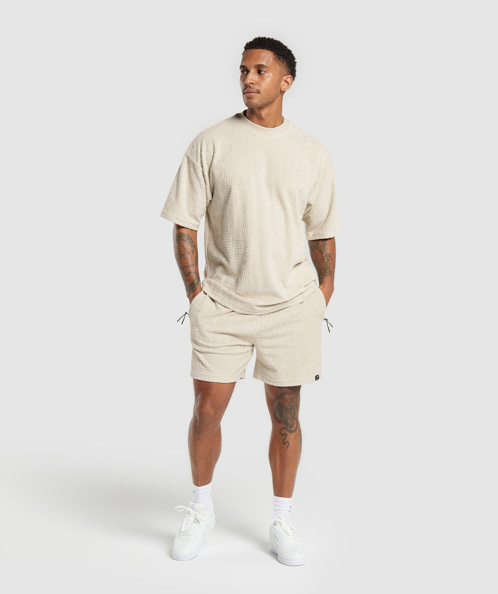 gymshark-towelling-7-shorts-pebble-grey-ss24