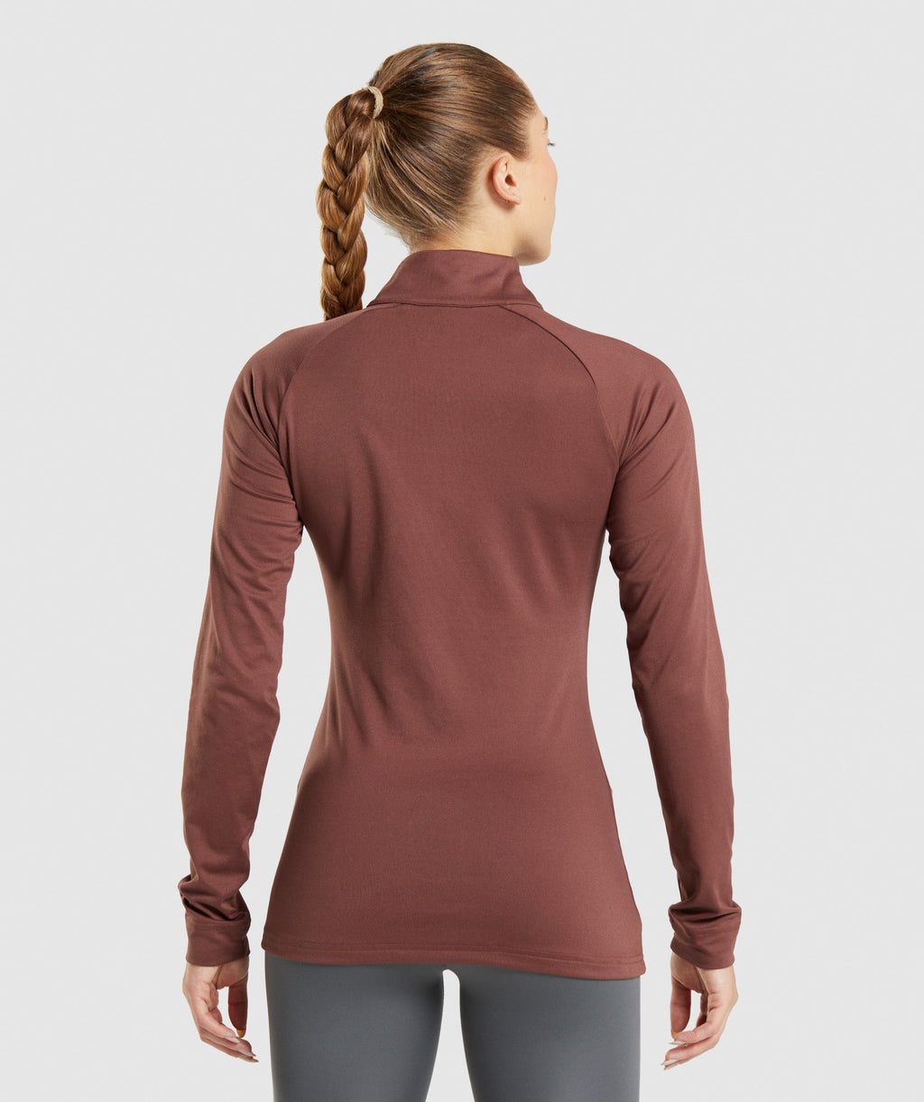 gymshark-training-1-4-zip-cherry-brown-ss22