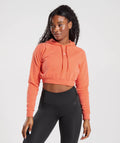 gymshark-training-cropped-hoodie-aerospace-orange-ss23