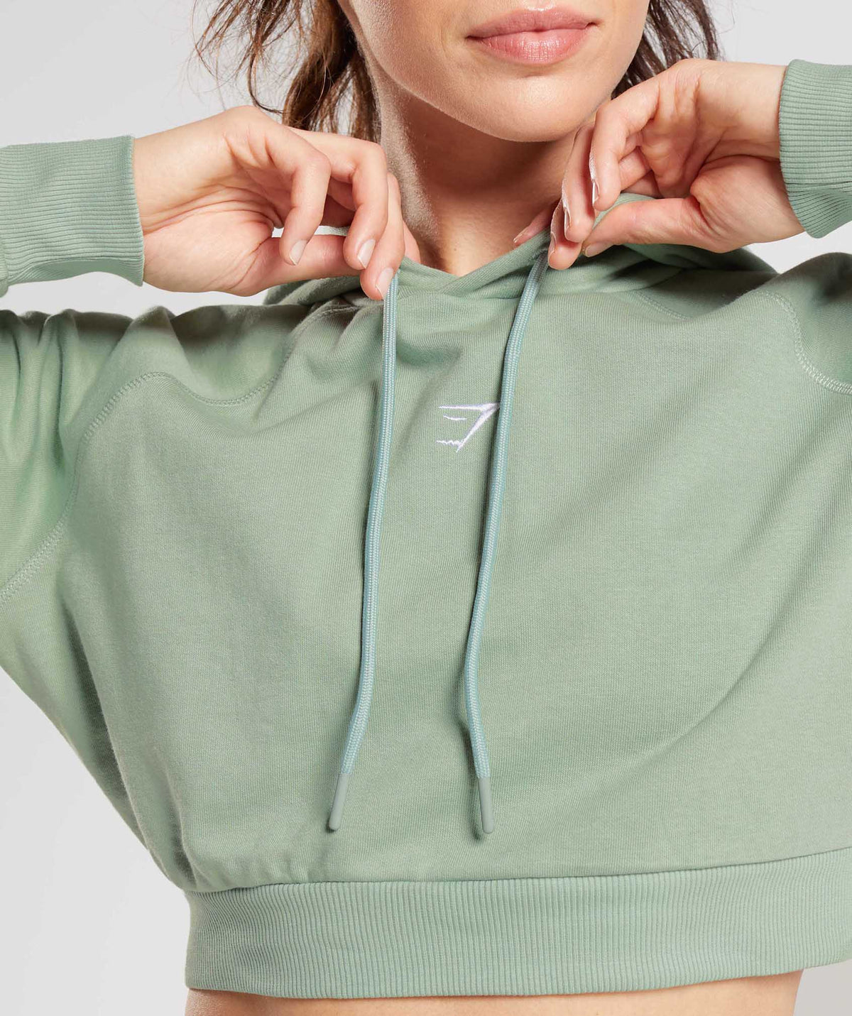 gymshark-training-cropped-hoodie-desert-sage-green-ss23