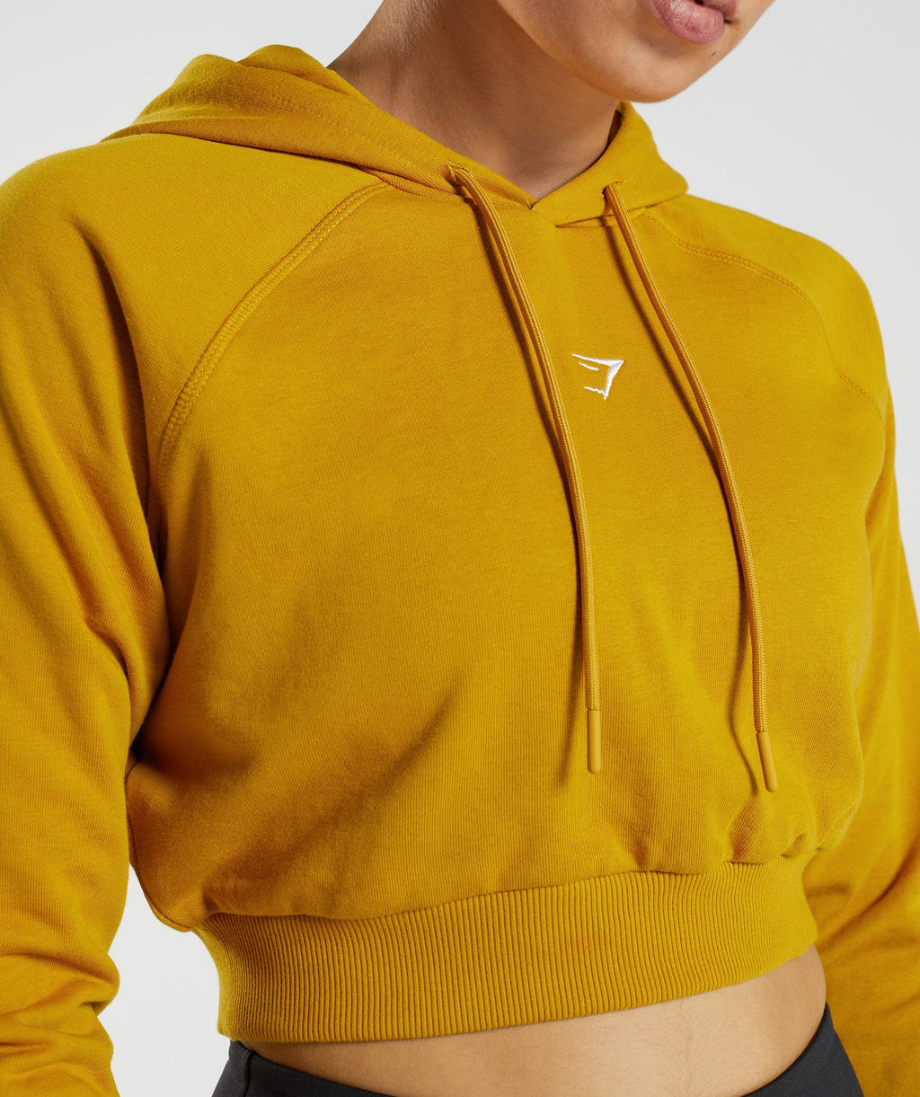 gymshark-training-cropped-hoodie-turmeric-yellow-aw22