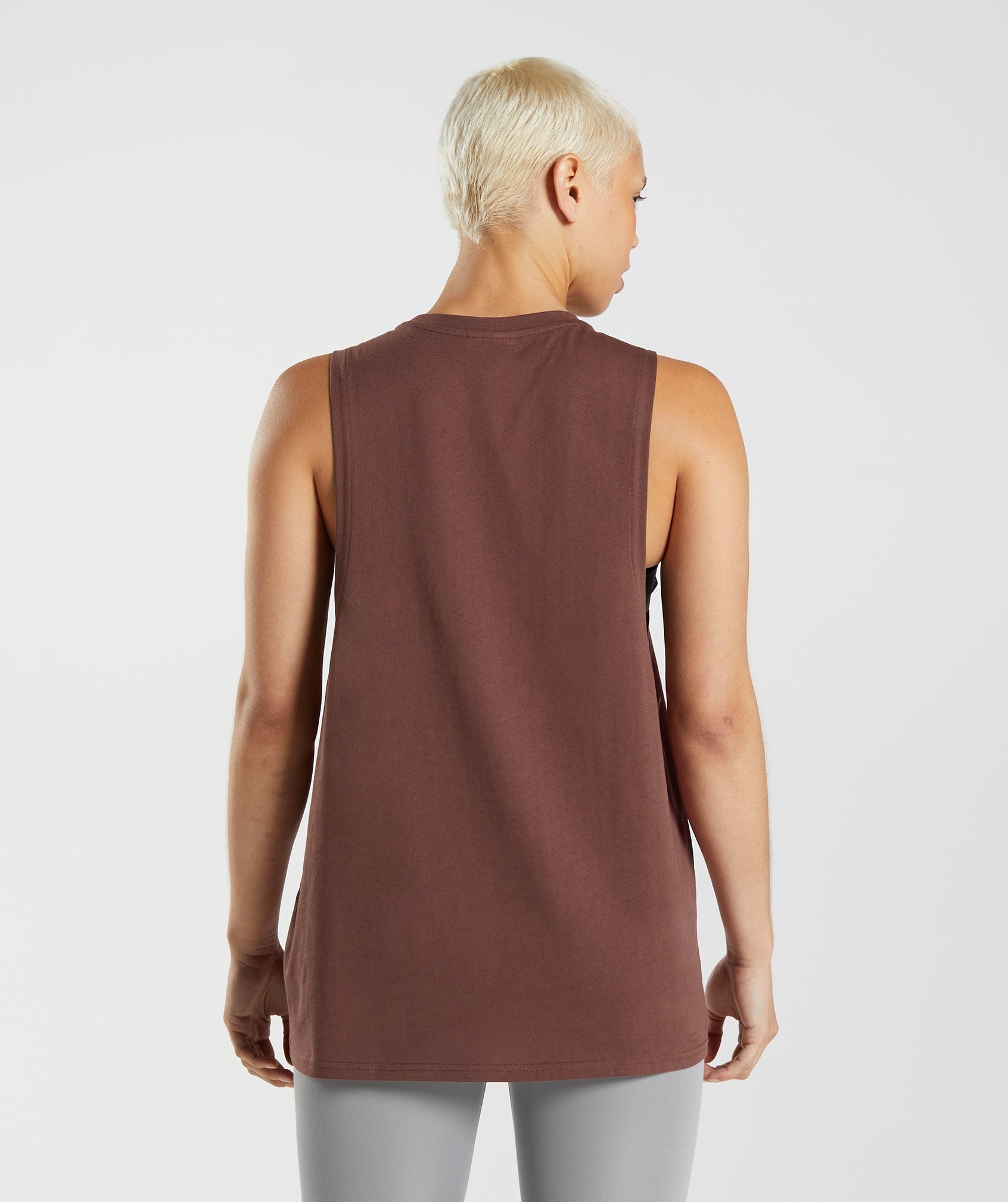 gymshark-training-drop-arm-tank-cherry-brown-aw22