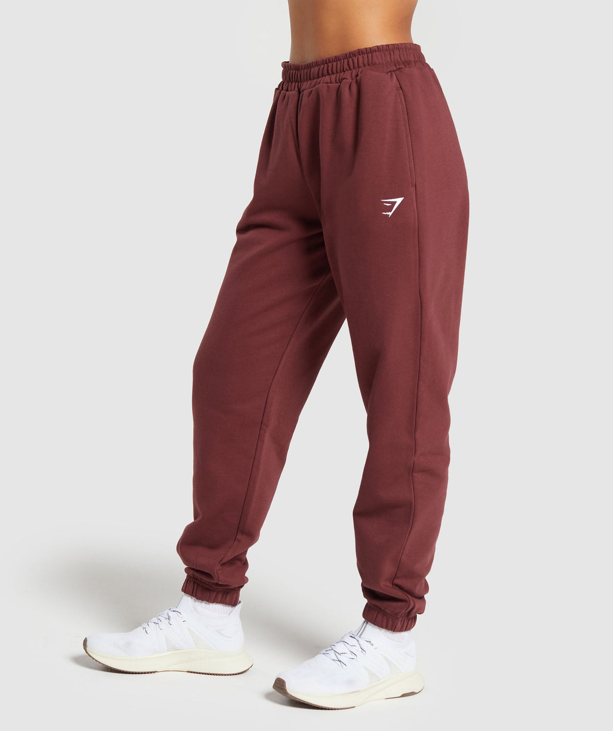 gymshark-training-fleece-joggers-burgundy-brown-ss24