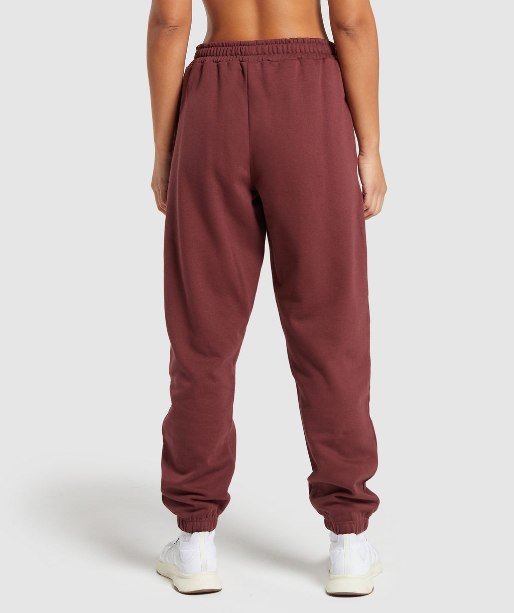 gymshark-training-fleece-joggers-burgundy-brown-ss24