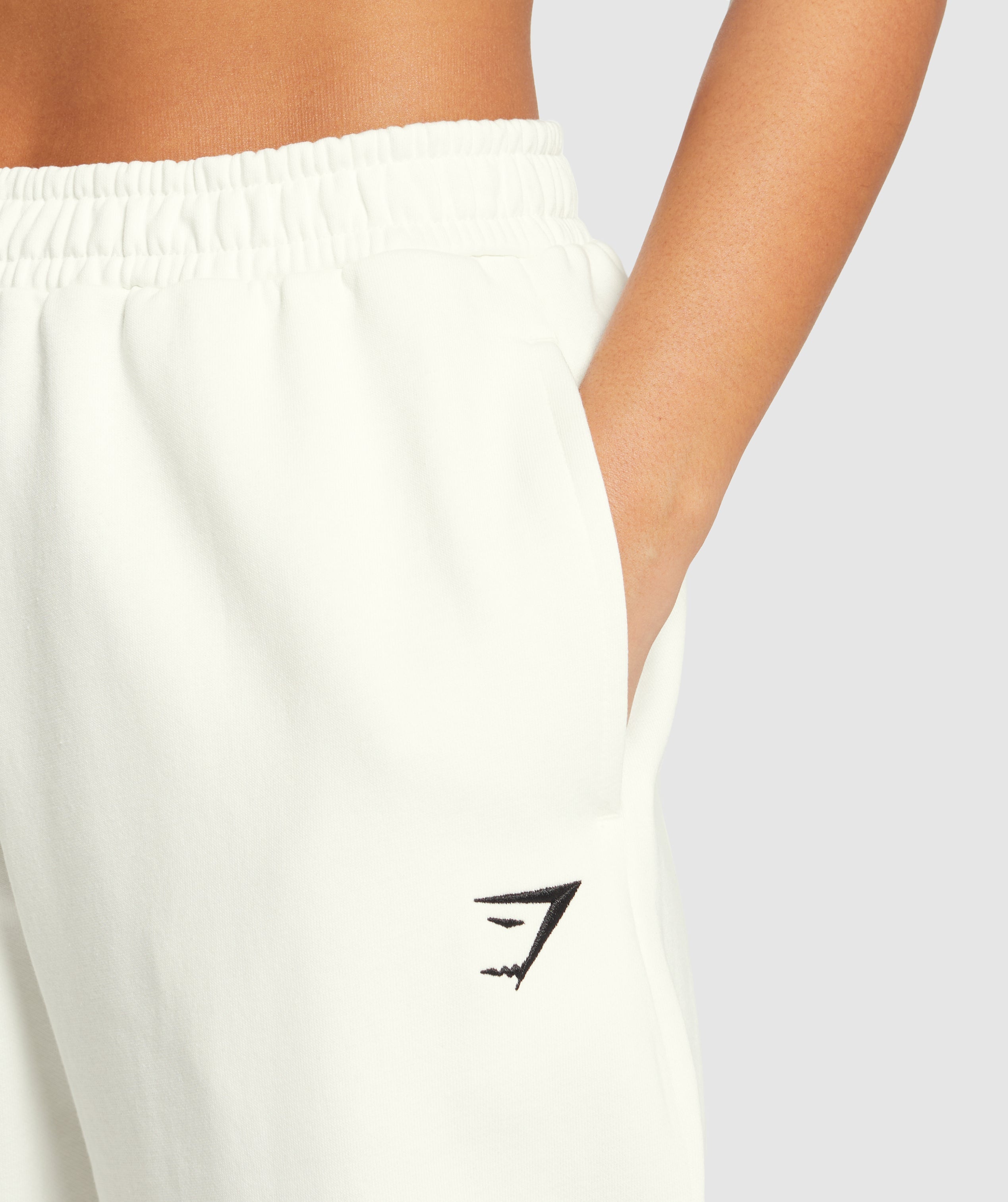gymshark-training-fleece-joggers-soft-white-ss25