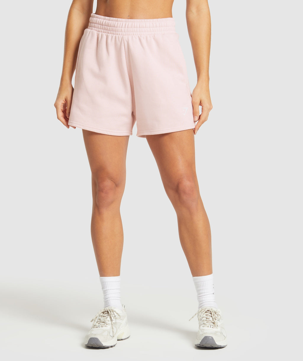 gymshark-training-fleece-shorts-fair-pink-ss25