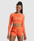 gymshark-training-long-sleeve-crop-top-papaya-orange-ss22