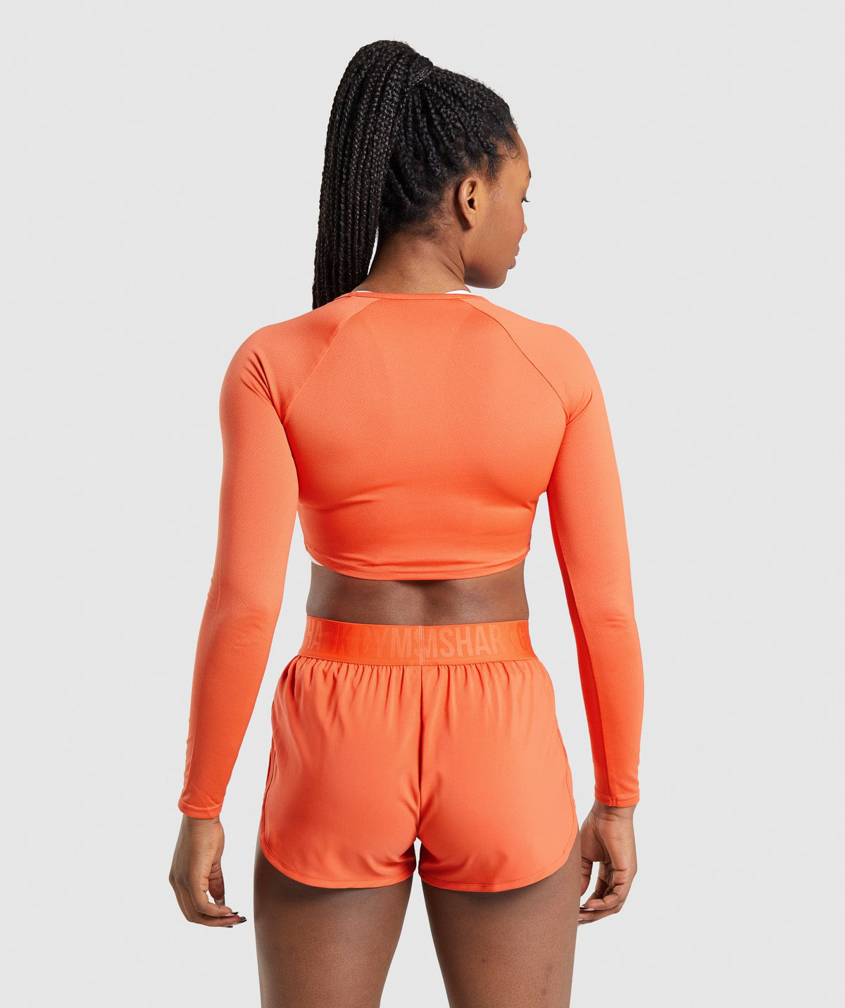gymshark-training-long-sleeve-crop-top-papaya-orange-ss22