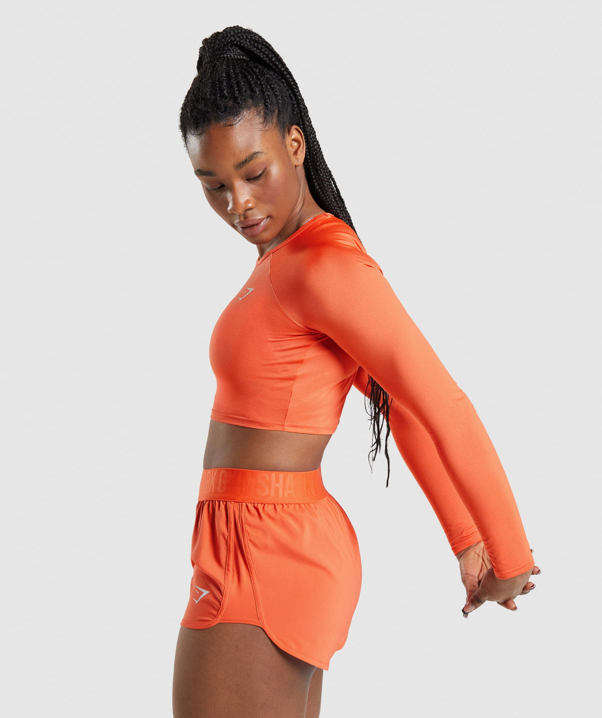 gymshark-training-long-sleeve-crop-top-papaya-orange-ss22