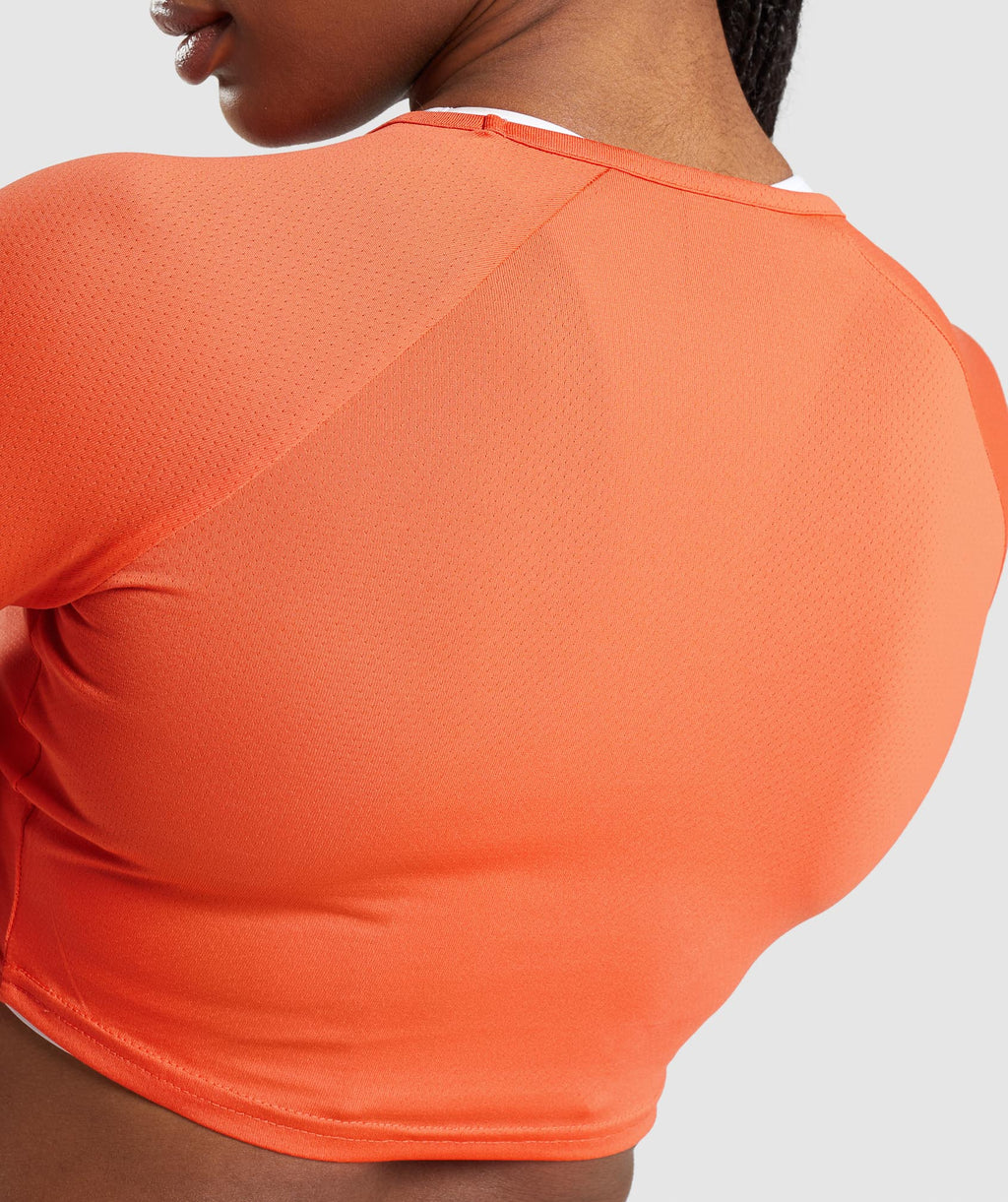 gymshark-training-long-sleeve-crop-top-papaya-orange-ss22
