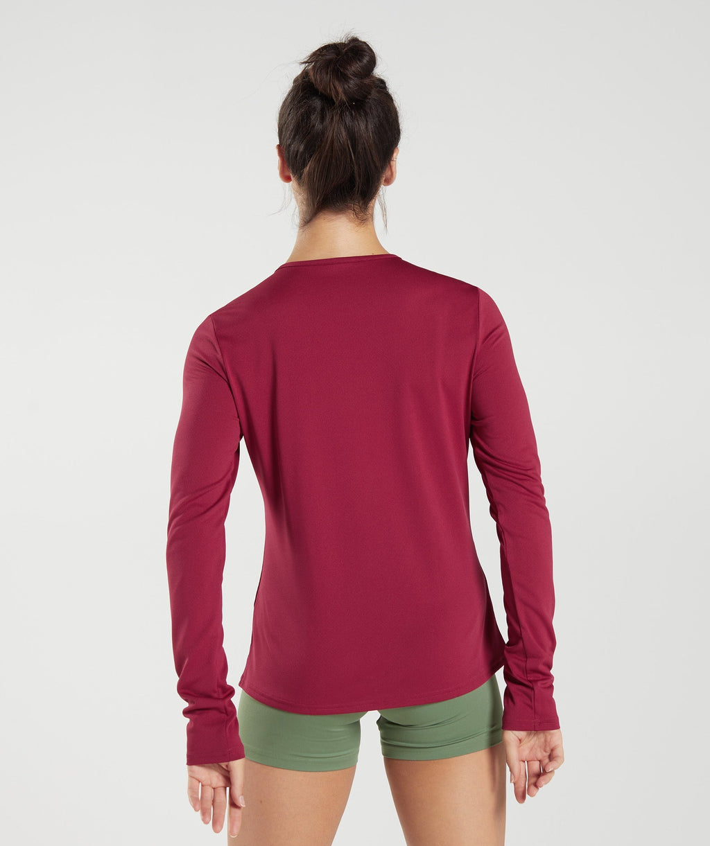gymshark-training-long-sleeve-top-currant-pink-aw22