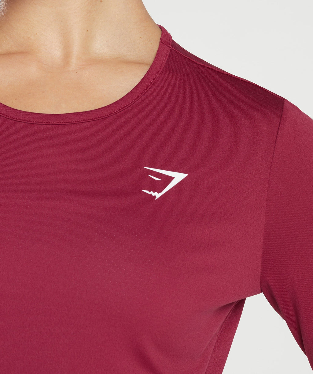 gymshark-training-long-sleeve-top-currant-pink-aw22