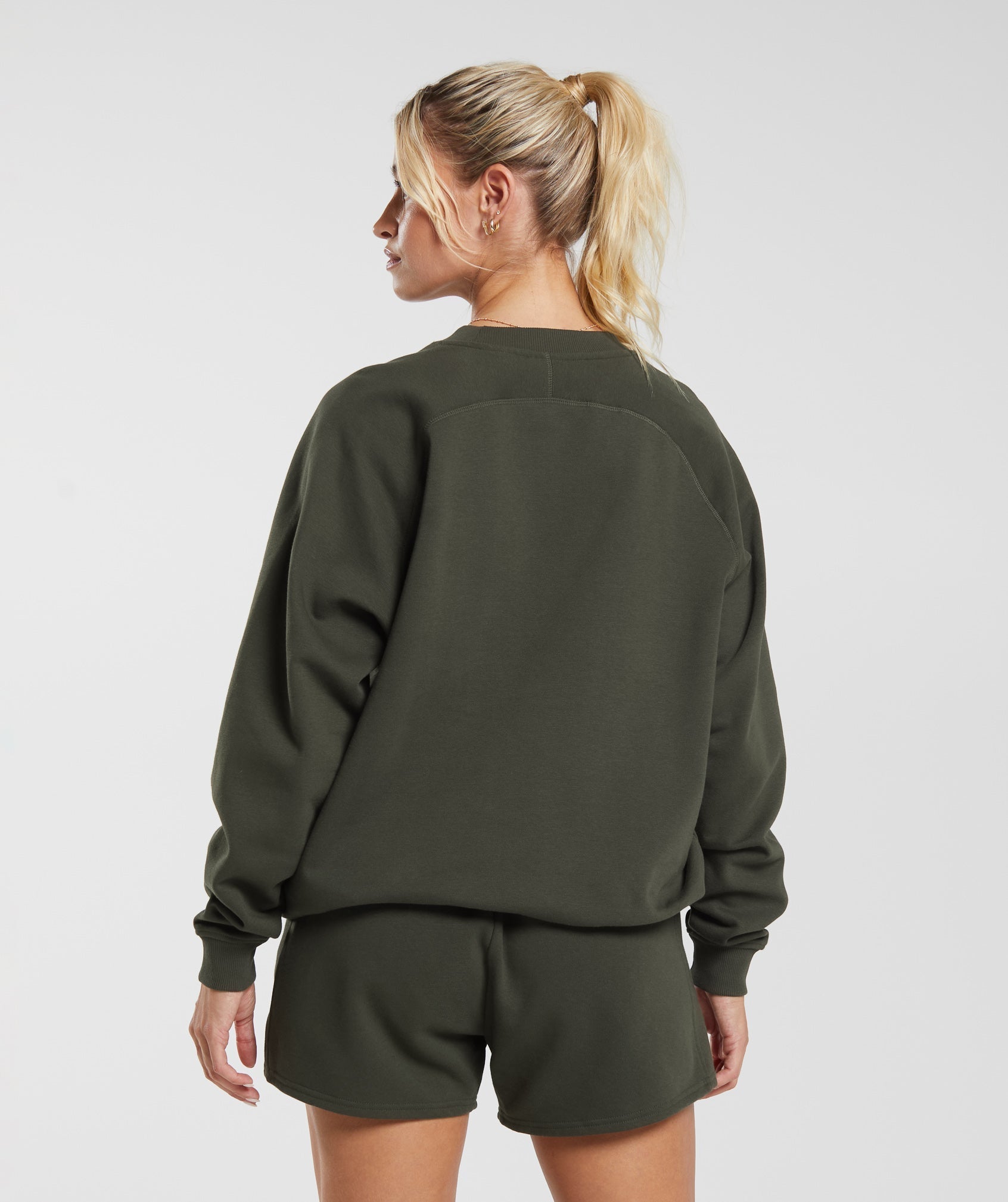 gymshark-training-oversized-fleece-sweatshirt-deep-olive-green-aw23