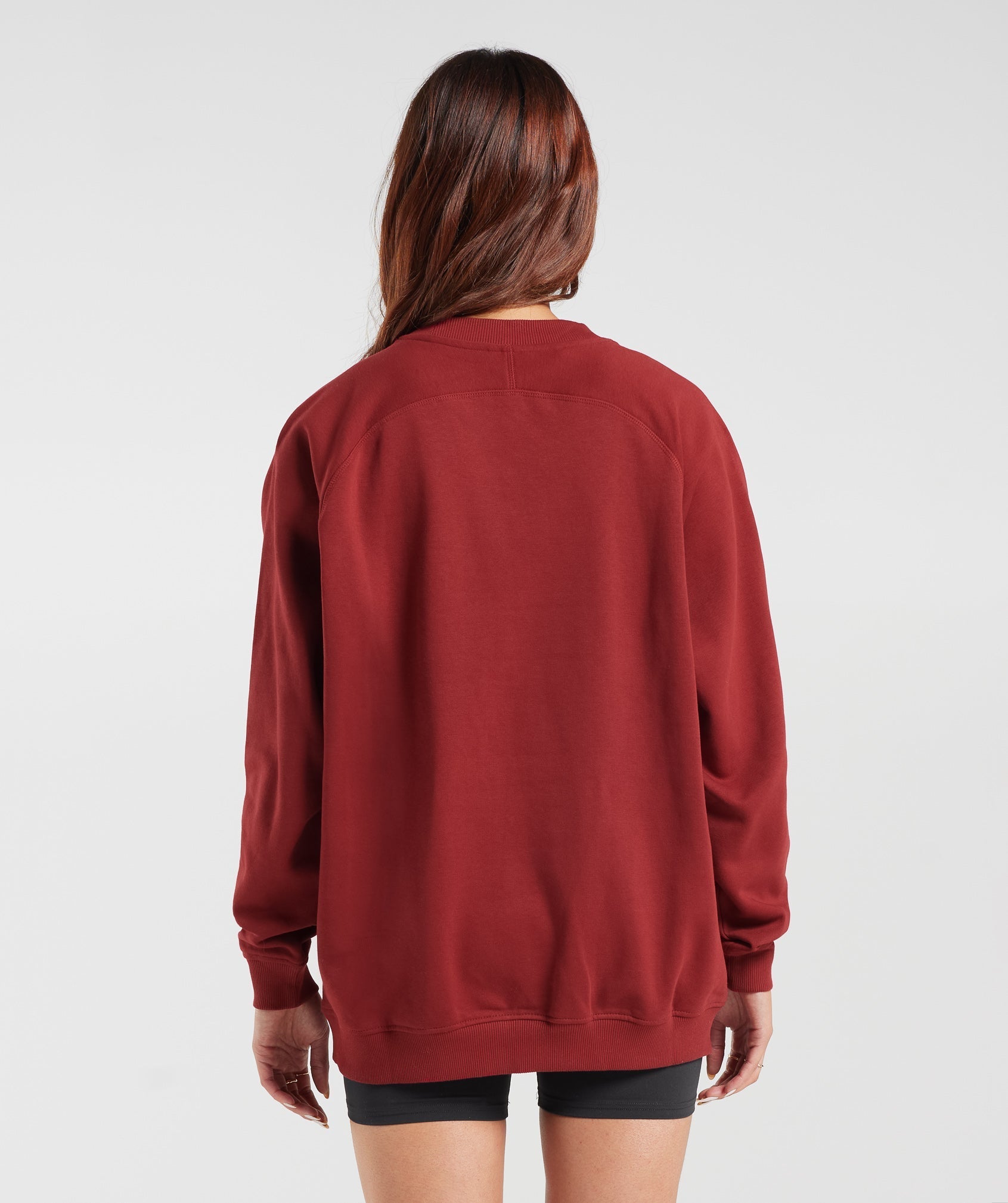 gymshark-training-oversized-fleece-sweatshirt-spiced-red-aw23