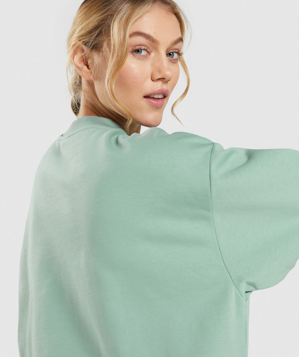 gymshark-training-oversized-sweatshirt-maya-blue-ss22