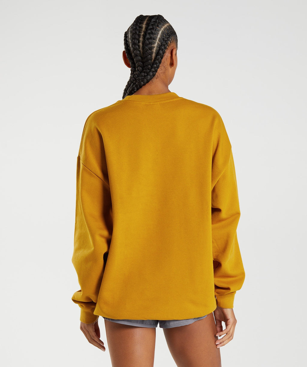 gymshark-training-oversized-sweatshirt-turmeric-yellow-aw22