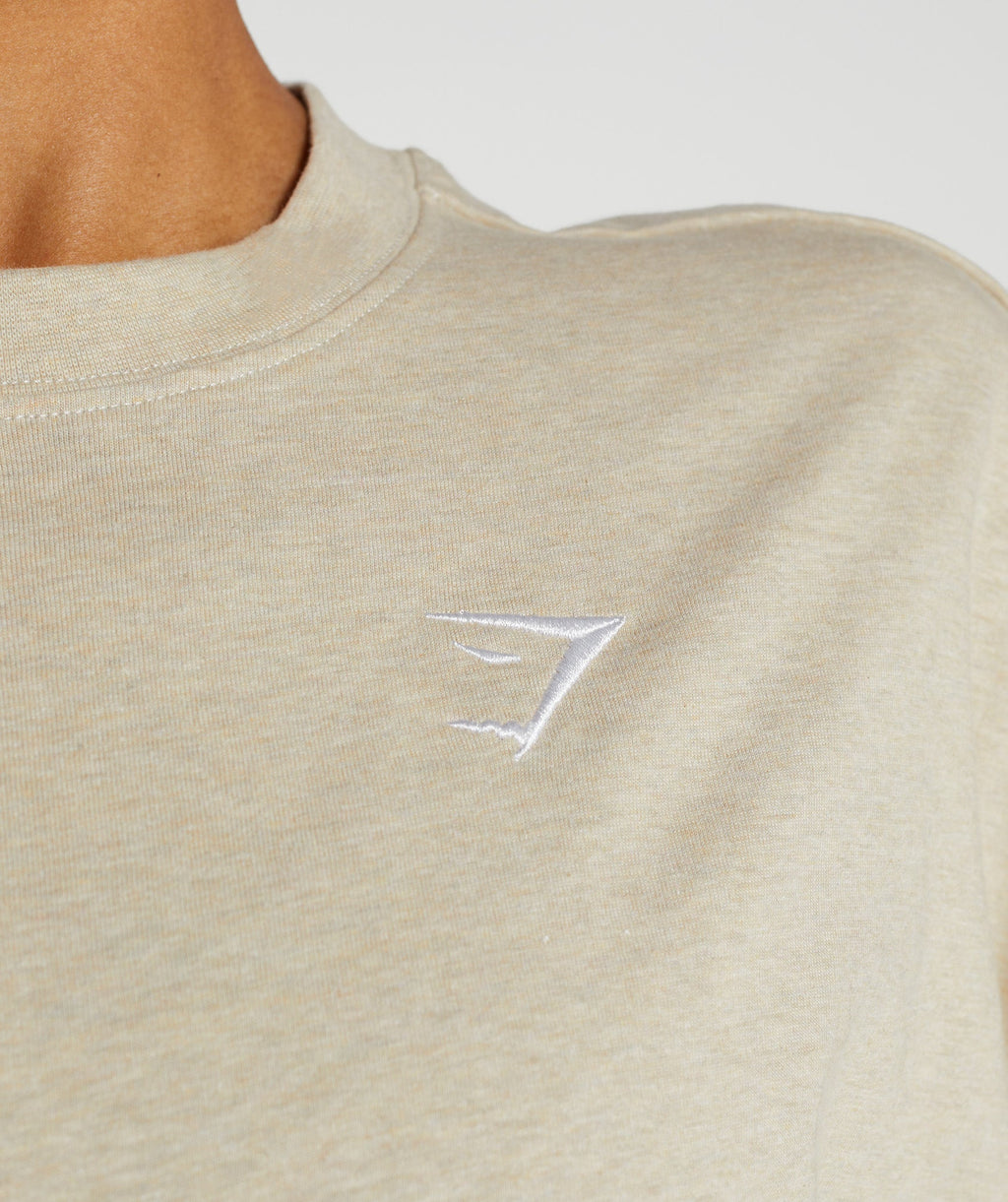 gymshark-training-oversized-t-shirt-sand-marl-aw22