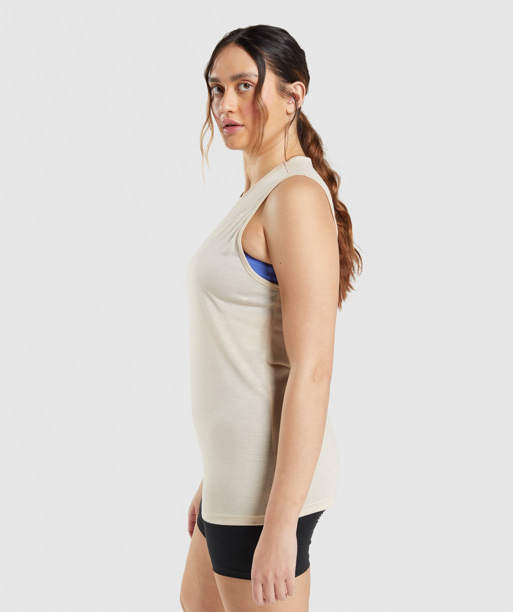 gymshark-training-drop-arm-tank-vanilla-brown-ss22