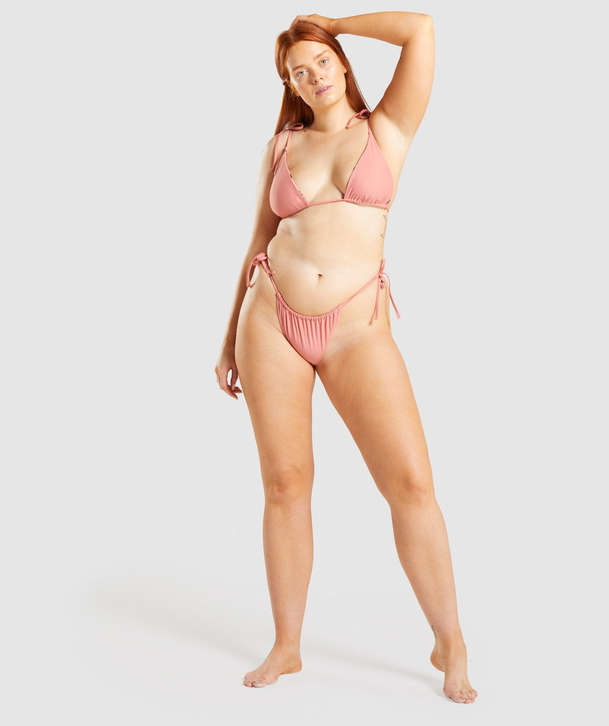 gymshark-triangle-reversible-bikini-bottoms-light-pink-print