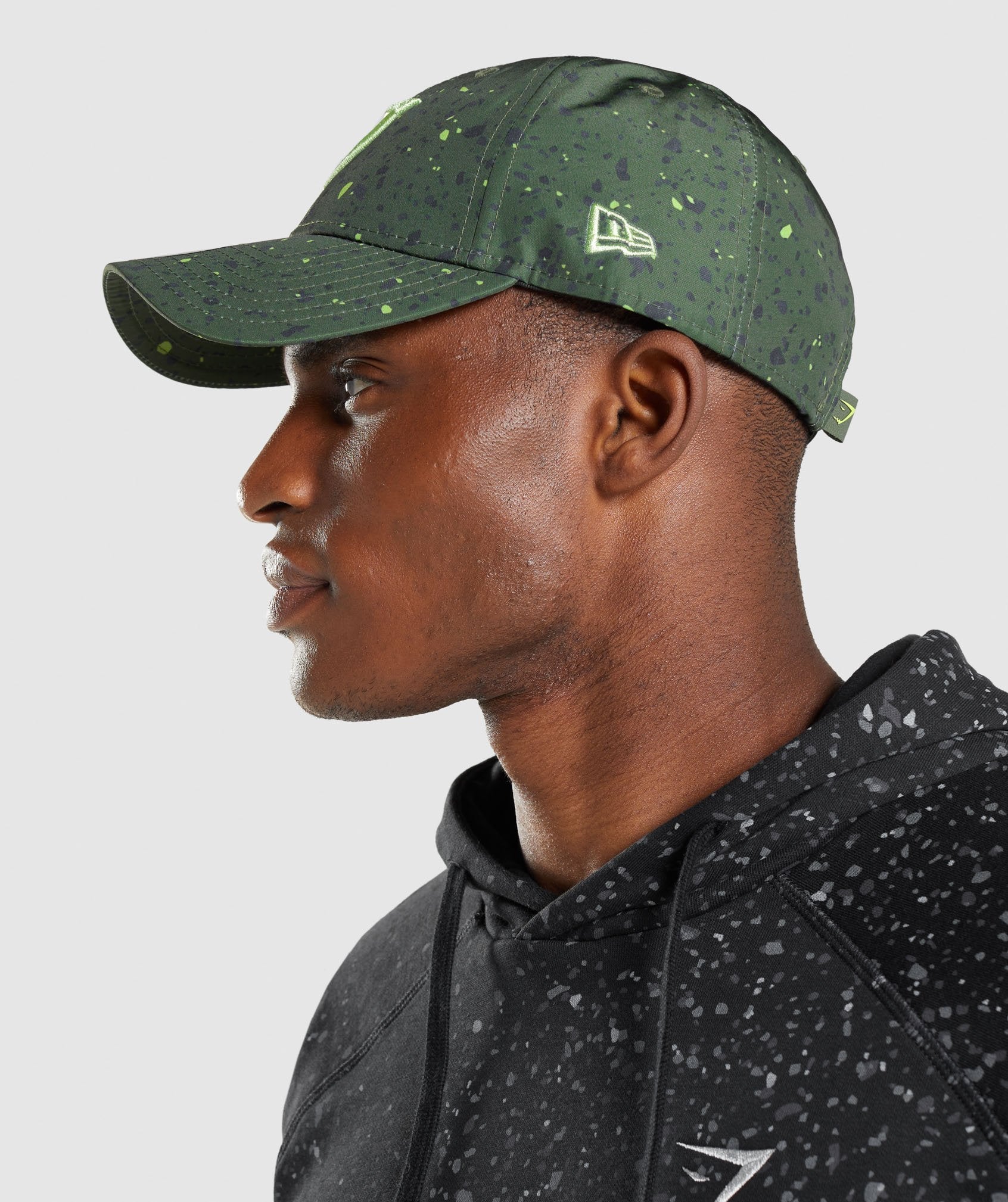 gymshark-new-era-universe-print-green-white