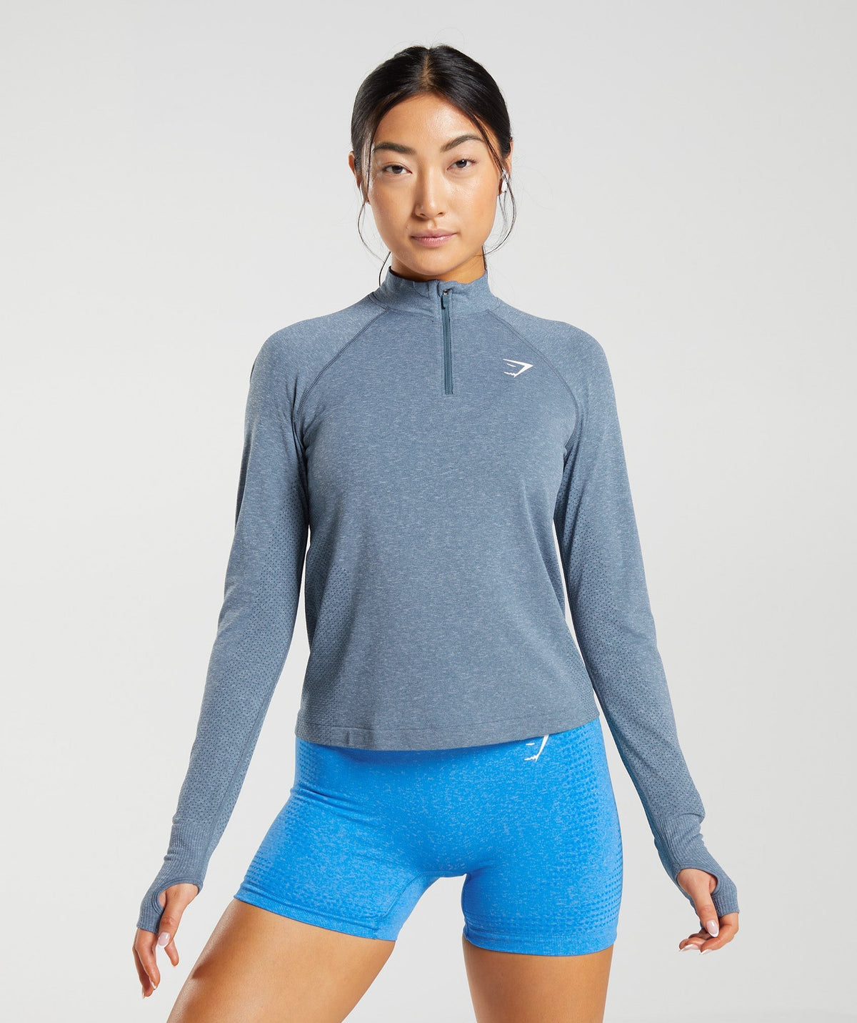 gymshark-vital-seamless-2-0-1-4-zip-pullover-evening-blue-marl-ss23