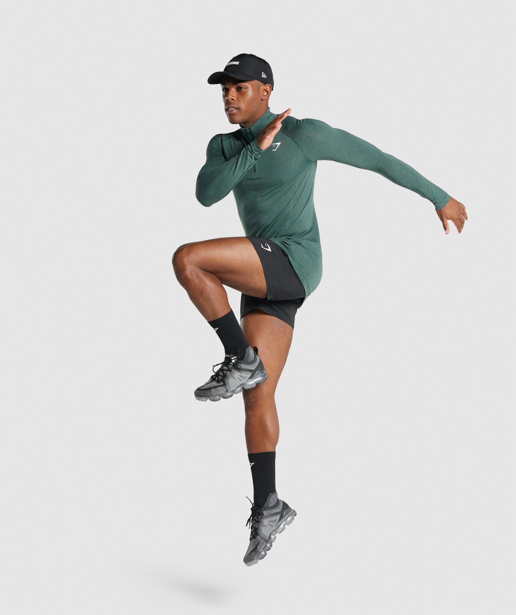 gymshark-vital-1-4-zip-dark-green-marl-white-logo