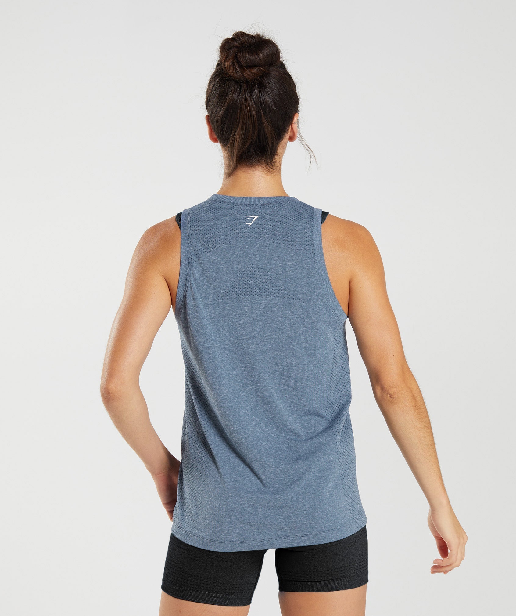 gymshark-vital-seamless-2-0-light-tank-evening-blue-marl-ss23