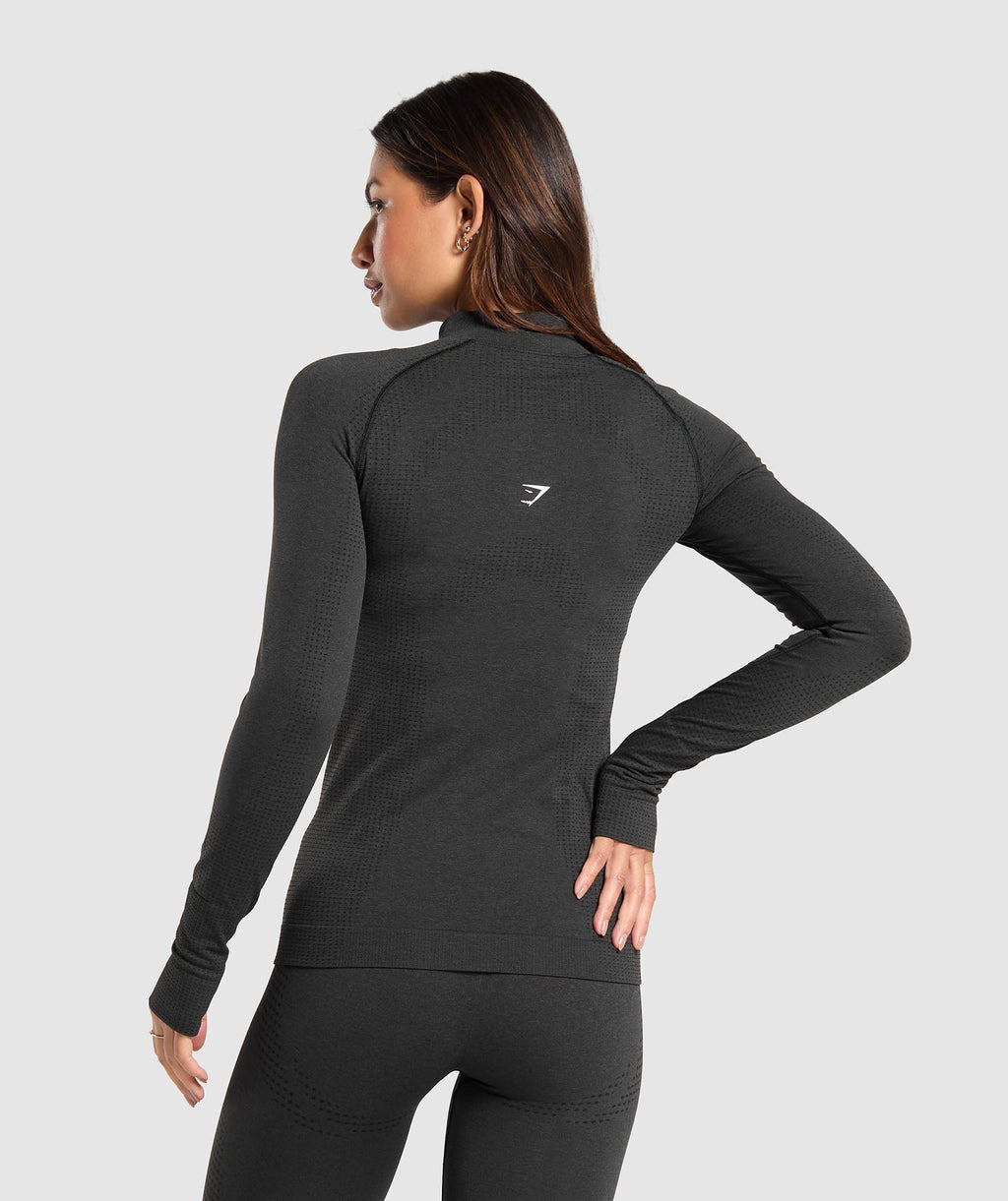 gymshark-vital-seamless-1-2-zip-pullover-black-marl-white-logo