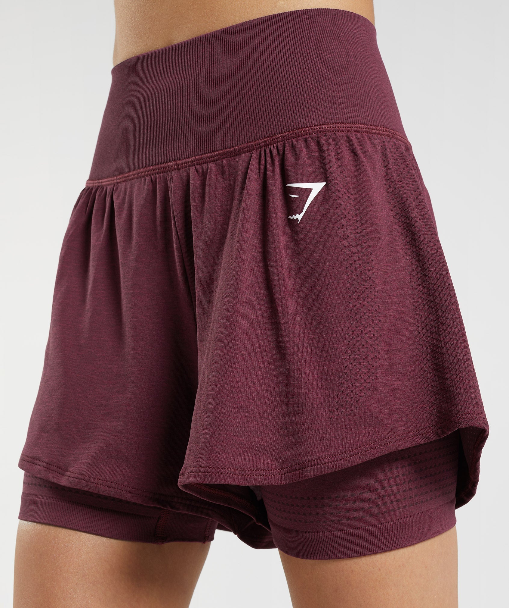 gymshark-vital-seamless-2-0-2-in-1-shorts-baked-maroon-marl-aw22